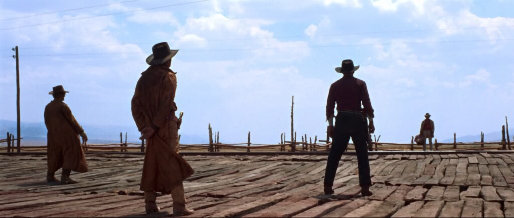 Captura-de-pantalla_1-12-2025_204457_www.youtube.com_-1024x435 La escena de apertura de 'Hasta que llegó su hora': arquitectura del silencio que funda un mito