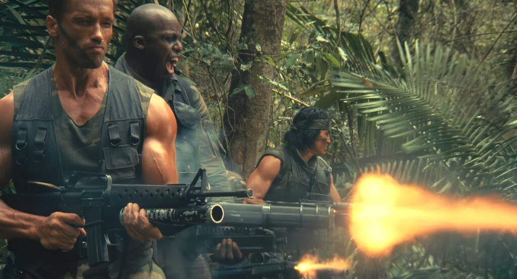 Captura-de-pantalla_3-3-2026_20287_www.youtube.com_-1024x552 La jungla como delirio balístico: cuando John McTiernan convirtió el músculo en vacío